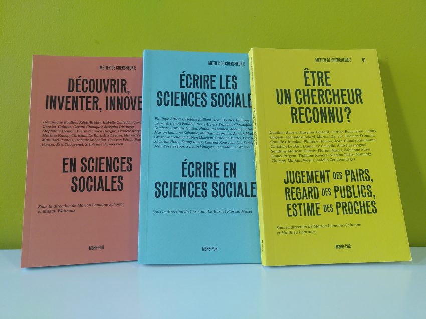 Les 3 livres de la collection sur une table.